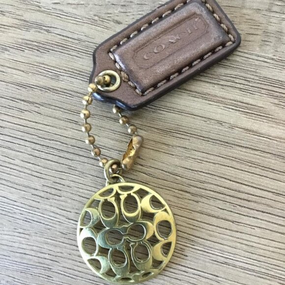 Coach Ergo Charm with Signature C Logo Cutout Pattern and Bronze Mini Tag - Picture 2 of 3